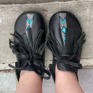 Native made hand-beaded authentic deerskin moccasins. Women size 10